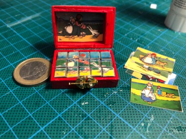 Puzzle - Jeu de cubes miniatures selon un modèle ancien .